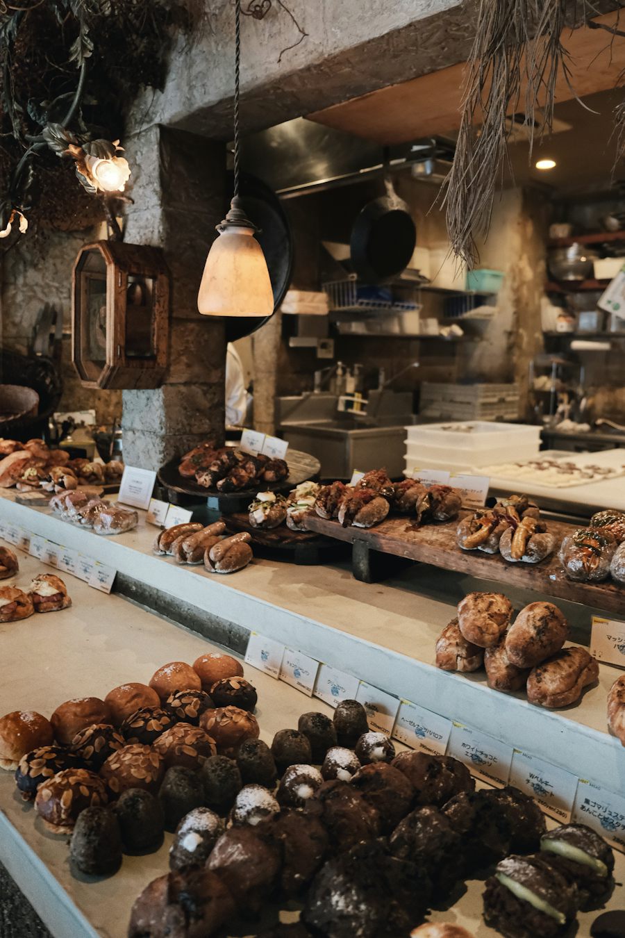 Bakery counter with loaves and pastries